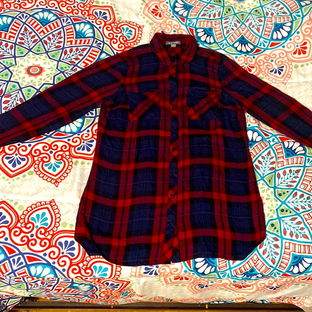 A women’s size medium plaid button up.
